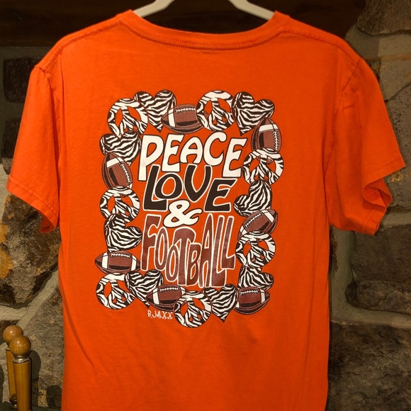 Tops - B. Jaxx Women’s Orange/Black Peace Love Football Tshirt